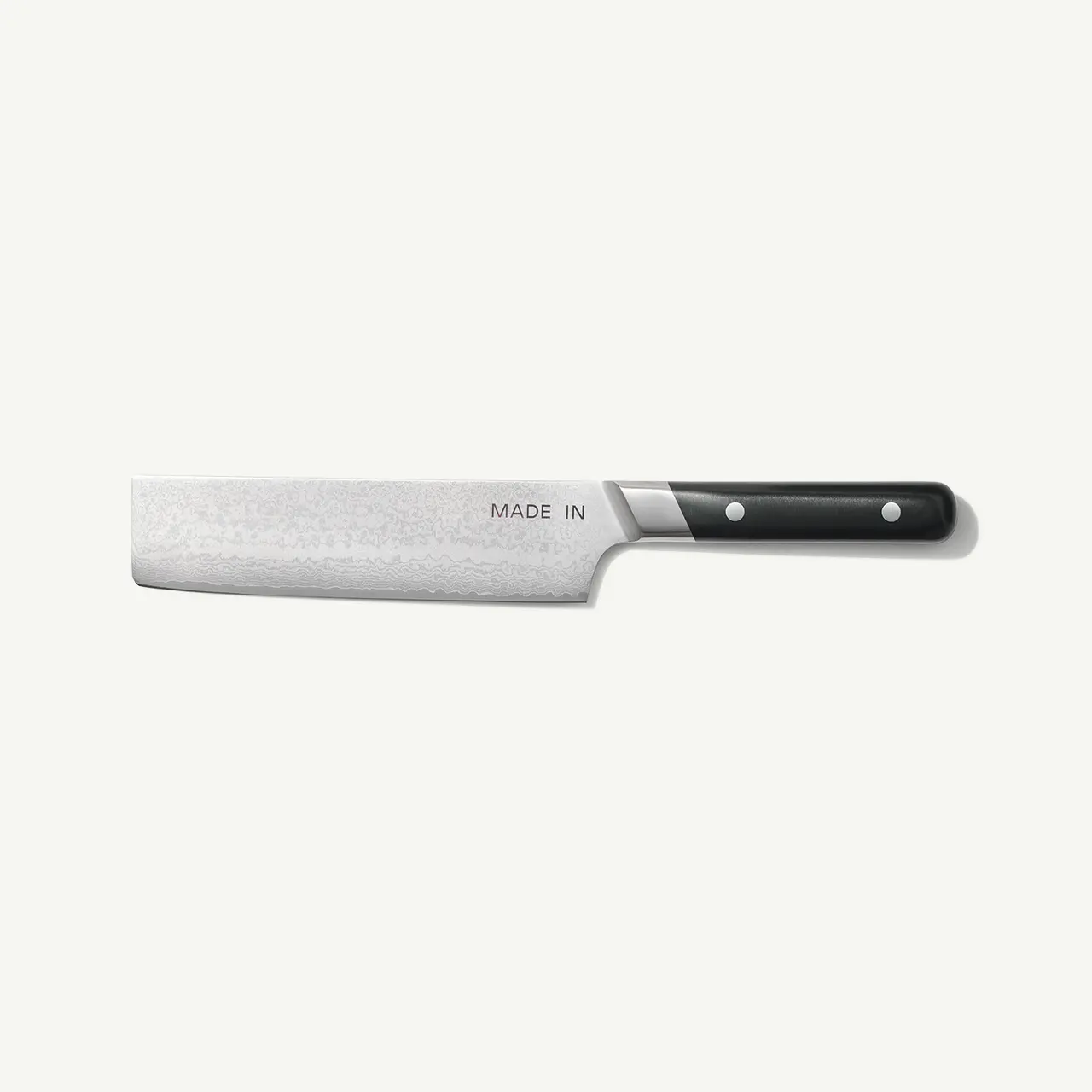 A chef's knife with a metal blade and a black handle is depicted on a plain background.