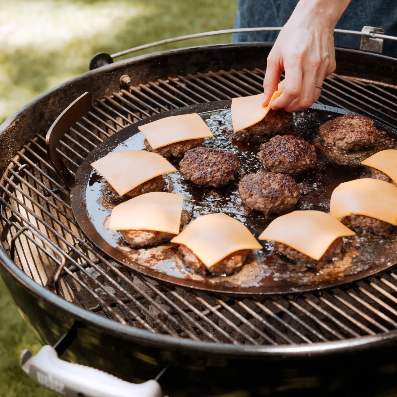 cheeseburgers on a grill