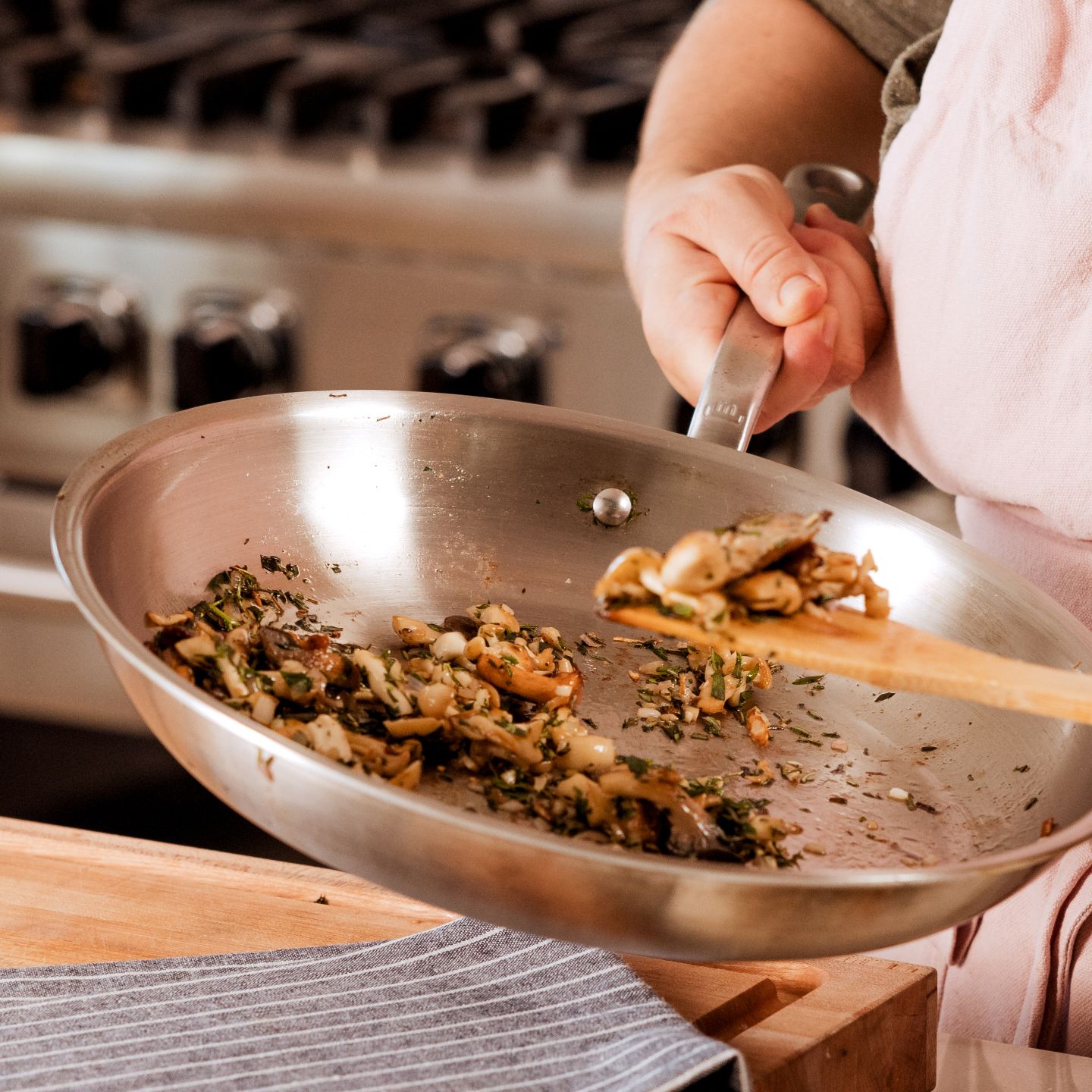 Cooks frying shop pan