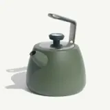 A modern green tea kettle with a sleek, rounded design and a stainless steel handle.