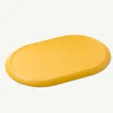 A solid yellow oval tray with a smooth surface.
