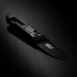 A sleek black folding knife is displayed on a dark background, highlighting its sharp blade and textured handle.