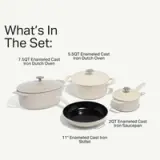 A collection of enameled cast iron cookware is displayed, including a 7.5QT Dutch oven, a 5.5QT Dutch oven, a 2QT saucepan, and an 11" skillet.