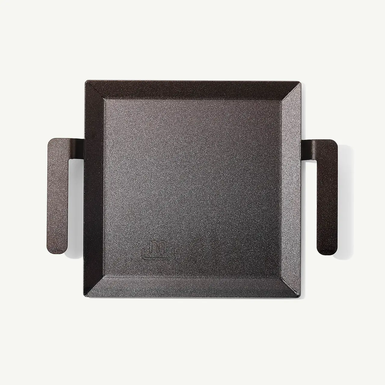 A square, black, non-stick grill pan with two side handles is displayed on a white background.