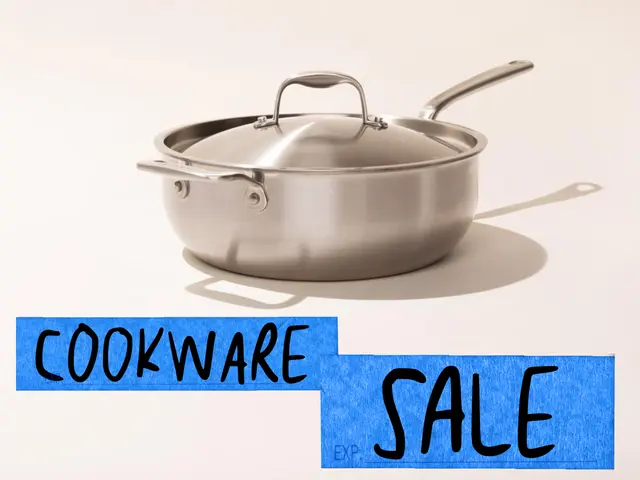 A stainless steel saucepan on a light background, with the word "COOKWARE" above and "SALE" below it, suggesting a promotion for kitchen items.