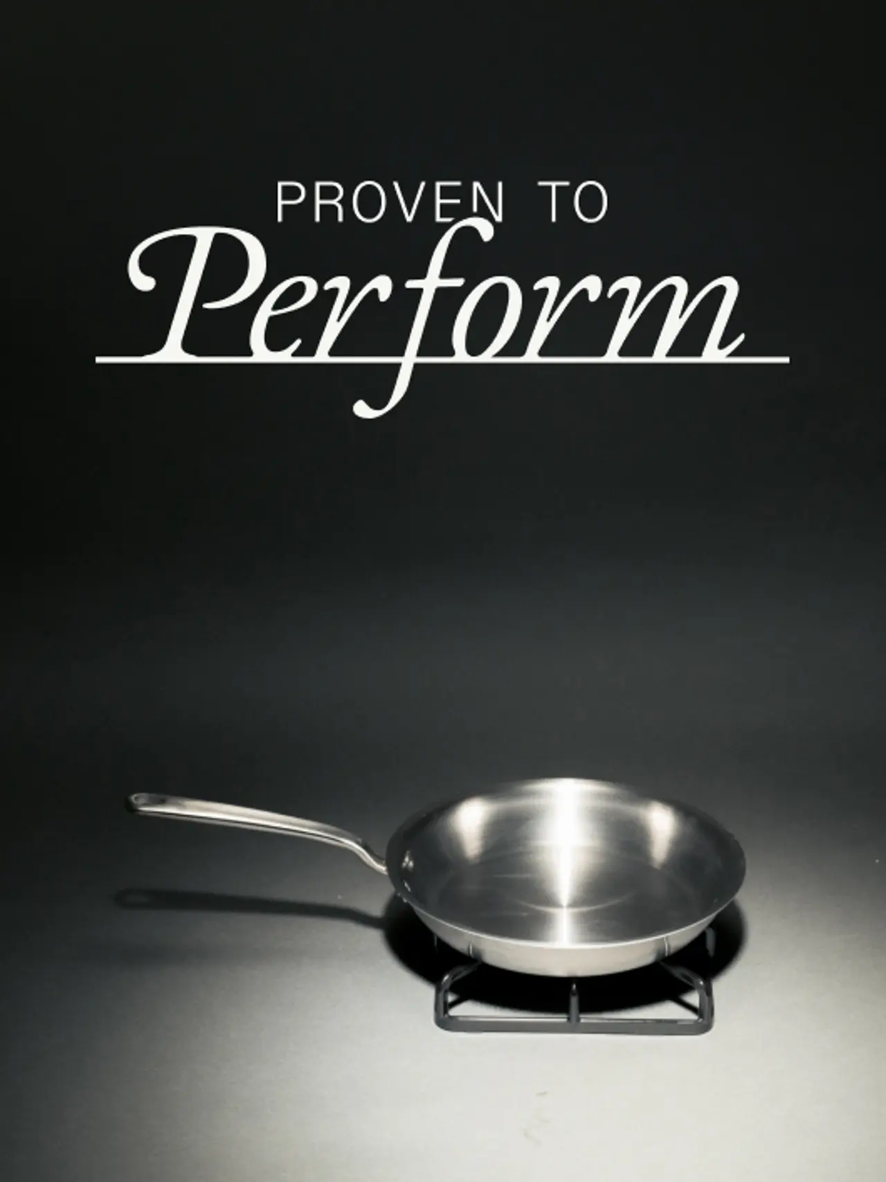 A stainless steel frying pan is centered against a dark background with the phrase "Proven to Perform" above it, possibly suggesting high-quality cookware.
