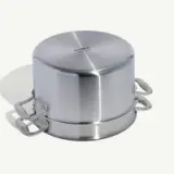 A stainless steel food container with clamps on the side sits on a light surface.