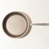 non stick frying pan desert tan top