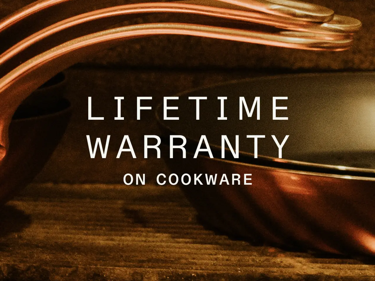 Stacked copper cookware is displayed with the text "LIFETIME WARRANTY ON COOKWARE" emblazoned above.