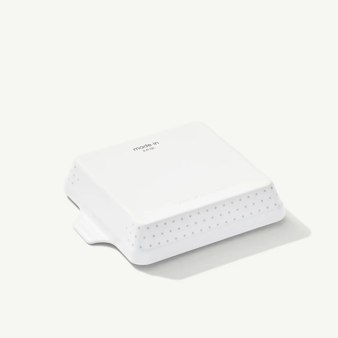 A white wireless router with visible brand and model information on a simple background.