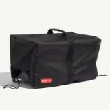 A black storage bag with a drawstring closure and a handle, featuring a red "MADE IN" label.