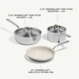 A collection of three non-stick cookware items, including a 2-quart saucepan with lid, a 3-quart saucier with lid, and a 10-inch frying pan, all labeled with their specifications.