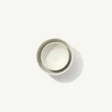 Two stacked white ceramic bowls are centered against a plain white background.