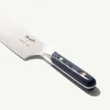 A sleek, high-quality kitchen knife featuring a polished stainless steel blade and an elegant handle with a blue design and gold accents.