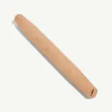 A wooden rolling pin with rounded ends is shown against a white background.