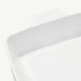 A white rectangular ceramic baking dish with handles is shown.
