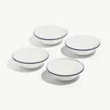 Four white bowls with a thin blue rim are arranged on a white background.