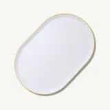 A white, oval-shaped tray with a yellow rim is shown against a light background.