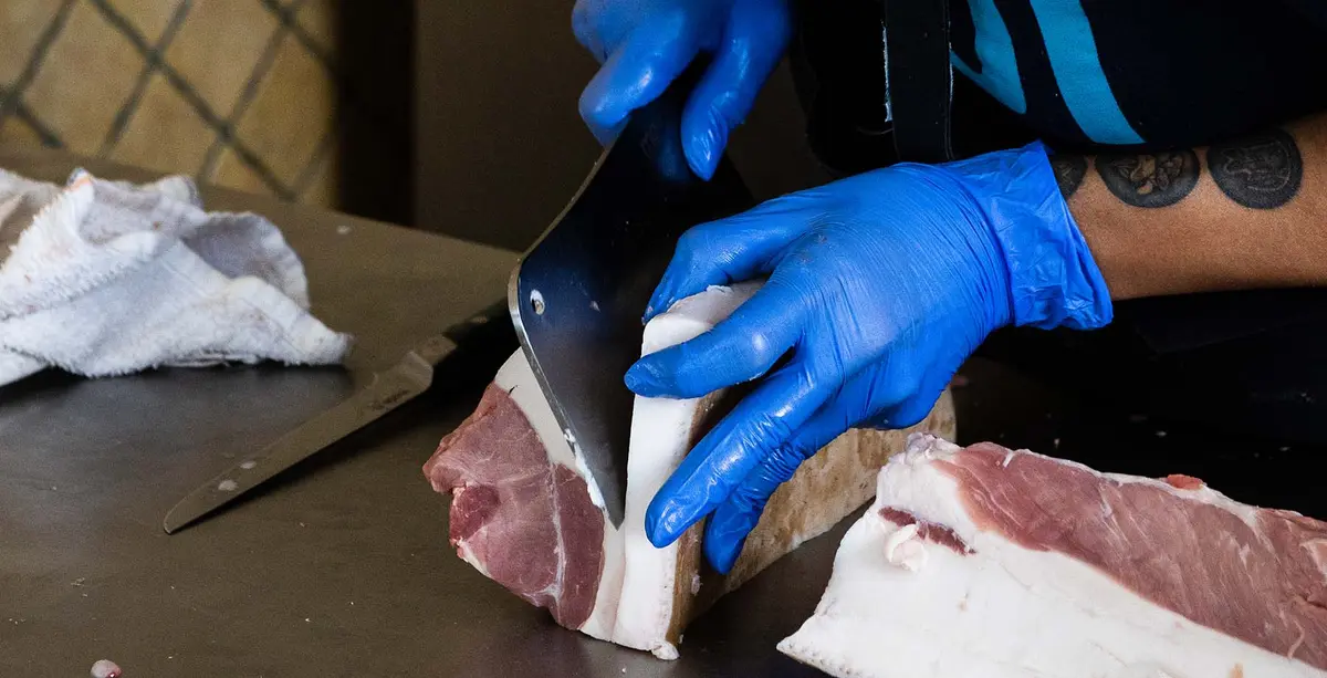 cleaver cutting meat