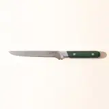 A kitchen knife with a green handle against a white background.