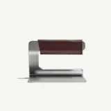 A modern, metal and leather knife holder with a sleek design.