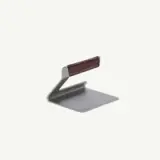 A minimalist gray stand with a leather-accented handle designed for holding small devices or objects.