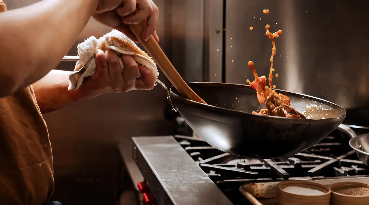 Carbon Steel vs. Cast Iron Woks: What’s the Difference?