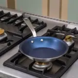 8 inch harbour blue non stick frying pan on range