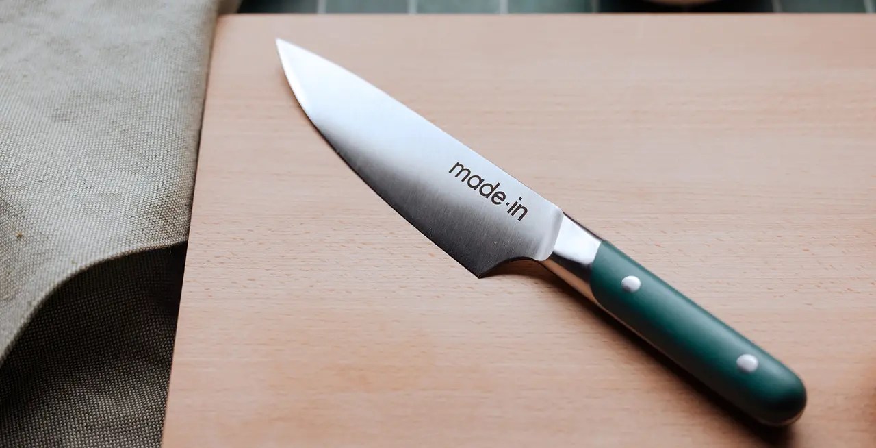hudson greeen chef knife on cutting board