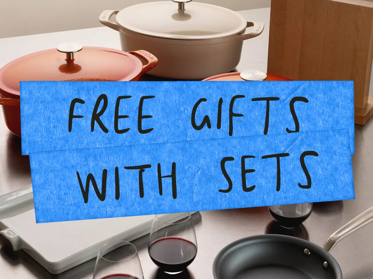 A collection of cookware and utensils is displayed alongside a promotional message for free gifts with sets.