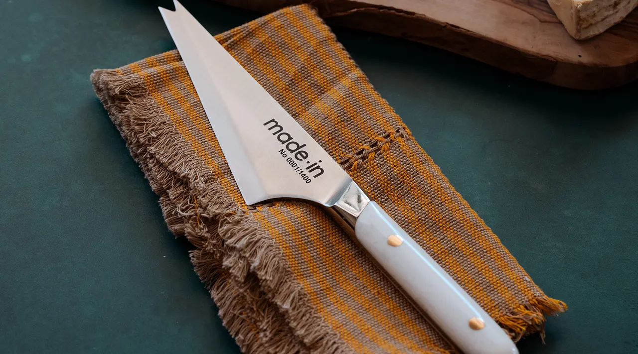 cheese knife on towel