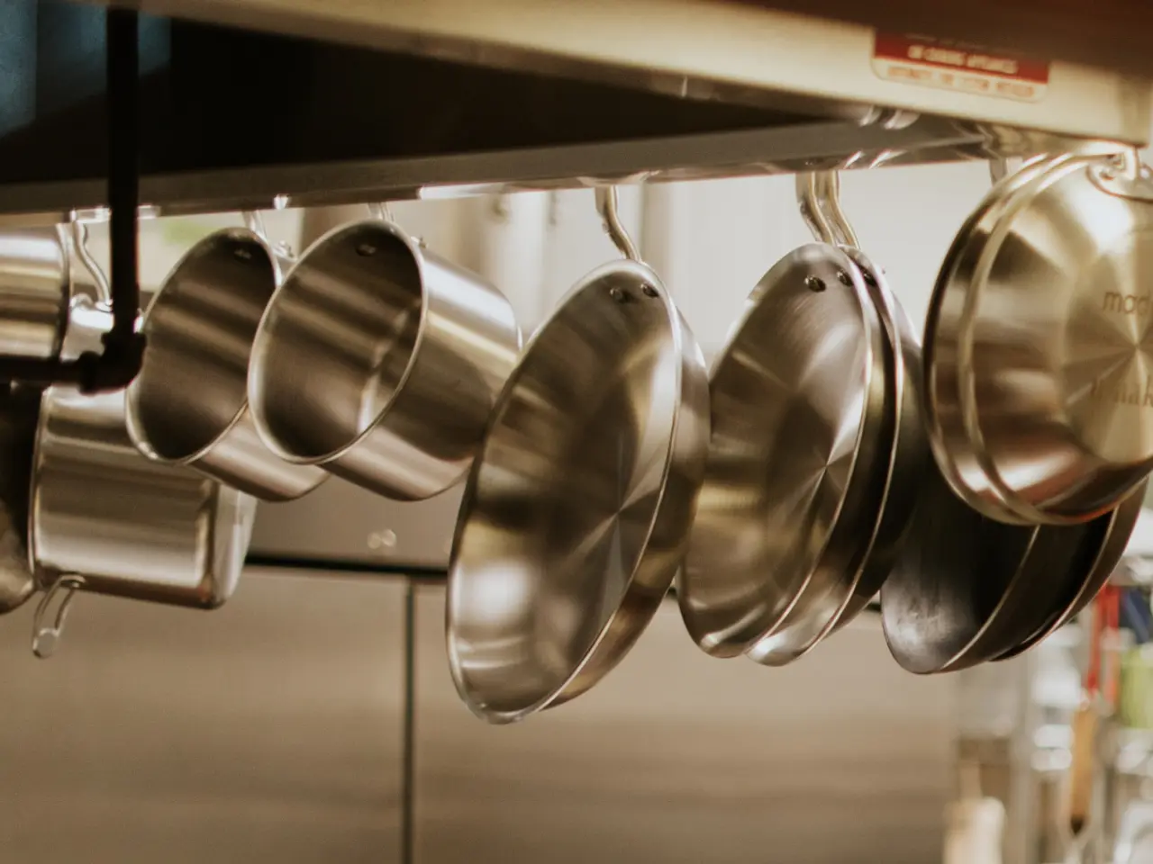stainless steel cookware hanging