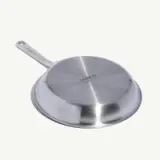 A stainless steel frying pan with a handle is shown upside down against a white background.