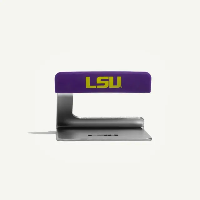 A metal bottle opener features a purple handle with "LSU" printed in yellow, symbolizing Louisiana State University.