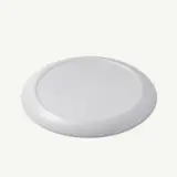 A smooth, round white plate with a slightly raised rim.