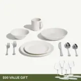 A white dishware set including plates, bowls, a mug, cutlery, and wine glasses, presented as a $99 value gift.