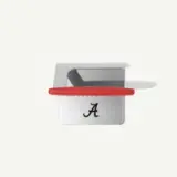 A silver aluminum cookie cutter with a red handle and a decorative letter "A" on its front.