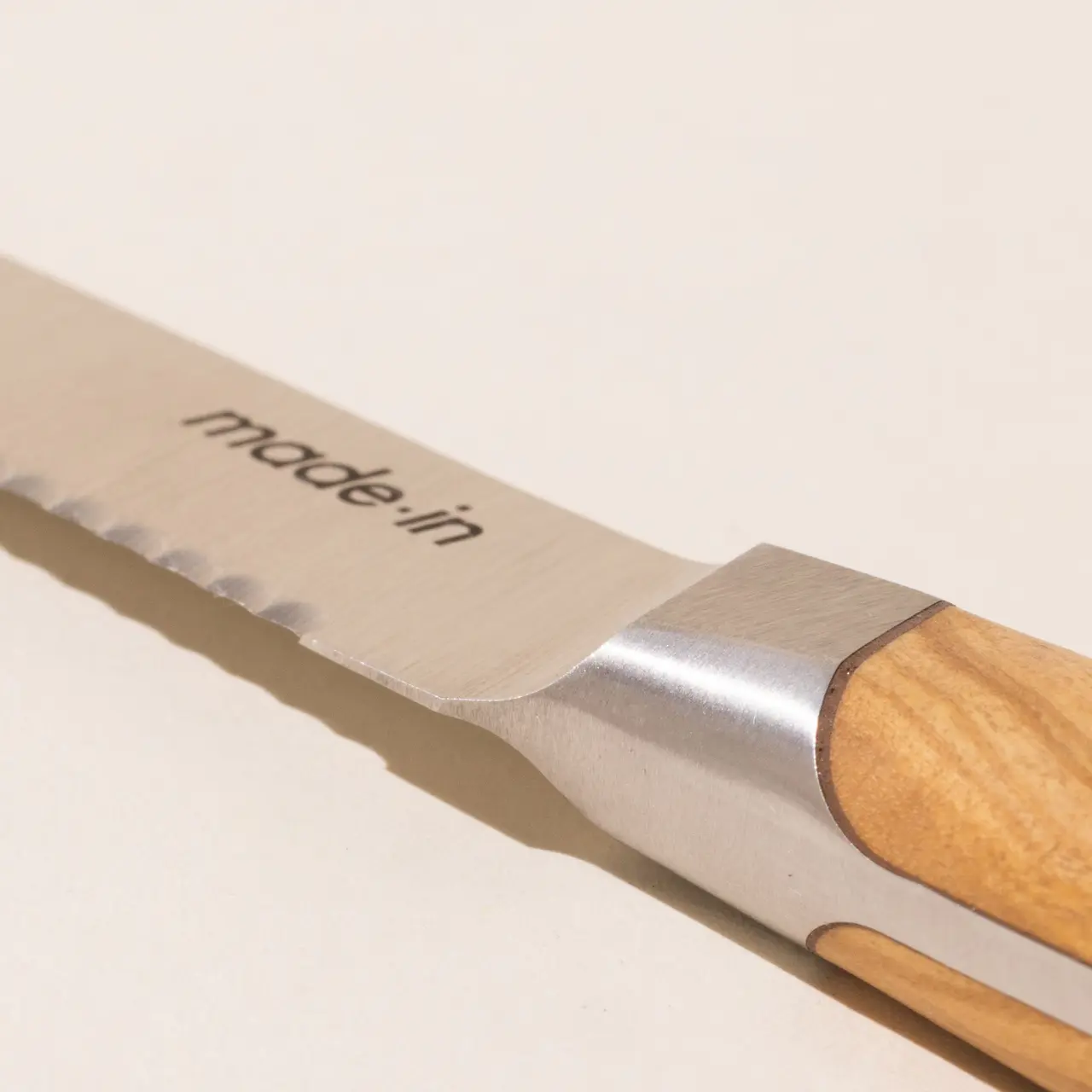 utility knife olive wood blade macro