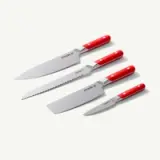 A set of four kitchen knives with red handles and varying blade shapes.