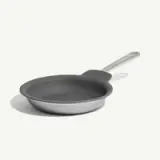 A stainless steel frying pan with a gray non-stick interior and a long handle.
