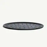 A round, dark-colored pizza tray featuring multiple perforations for enhanced air circulation.