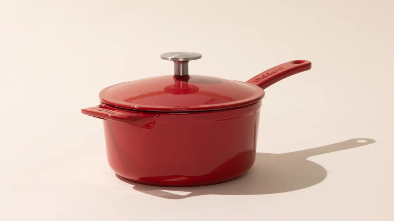 enameled cast iron saucepan made in red with lid