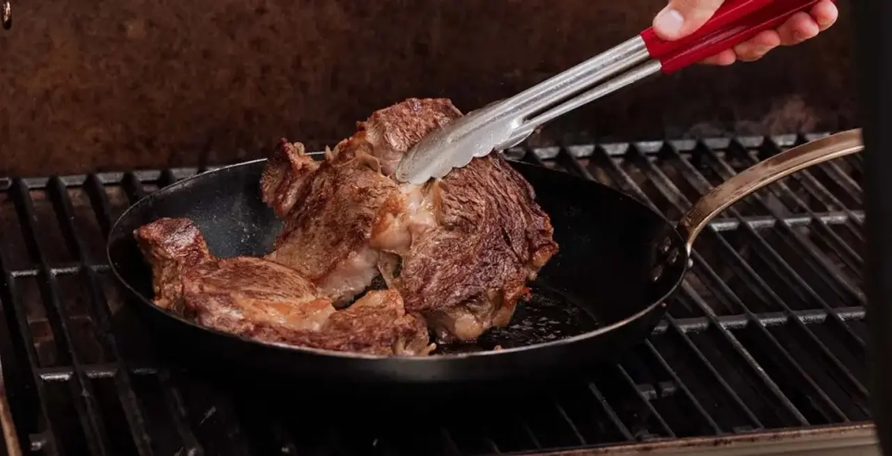 steak in carbon frying pan