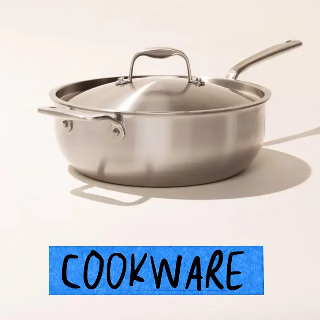 A stainless steel saucepan with a lid on top and the word "COOKWARE" written below it on a blue background.