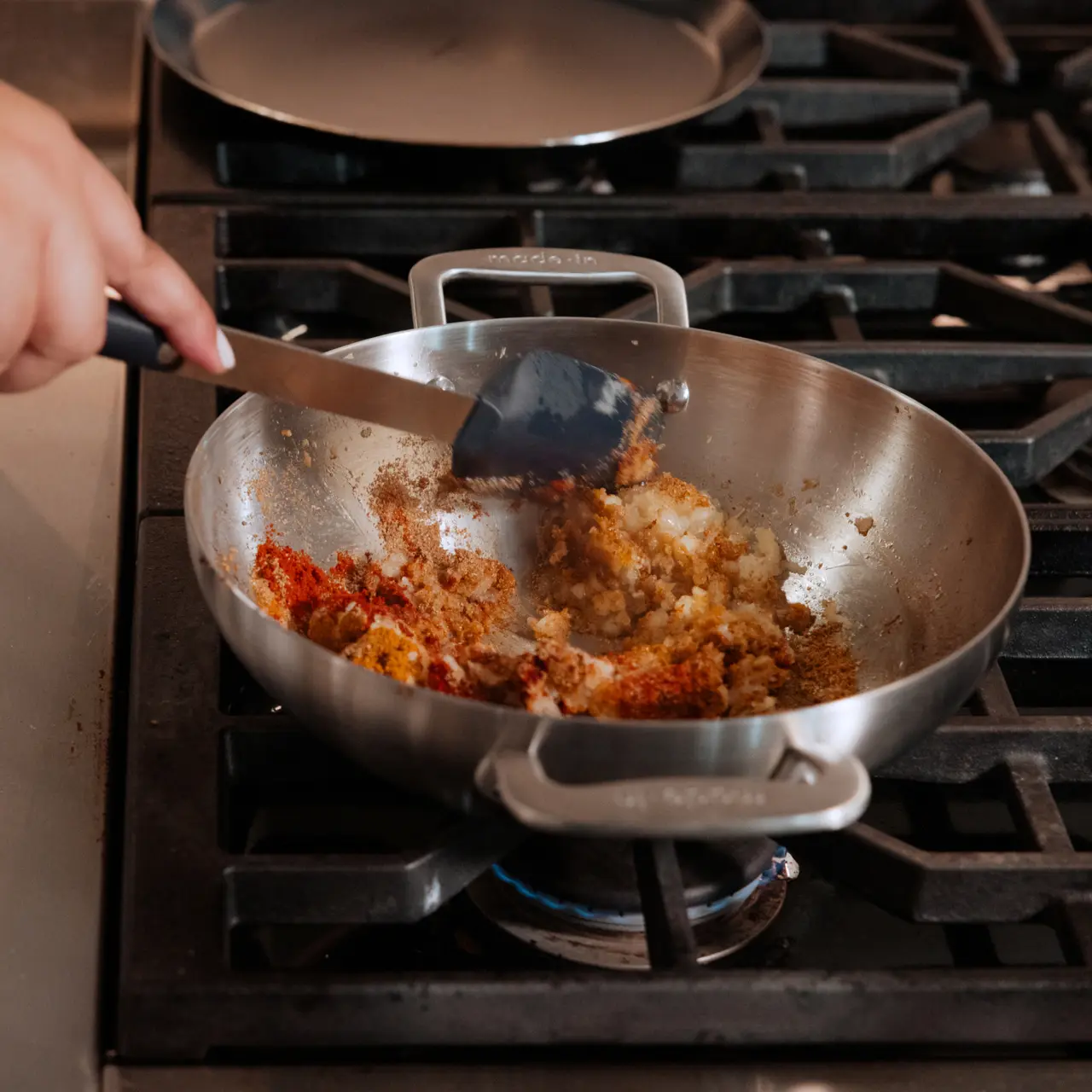 food in  a stainless steel kadai