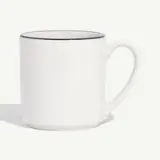 A simple white ceramic mug with a blue rim and a handle on the right side.