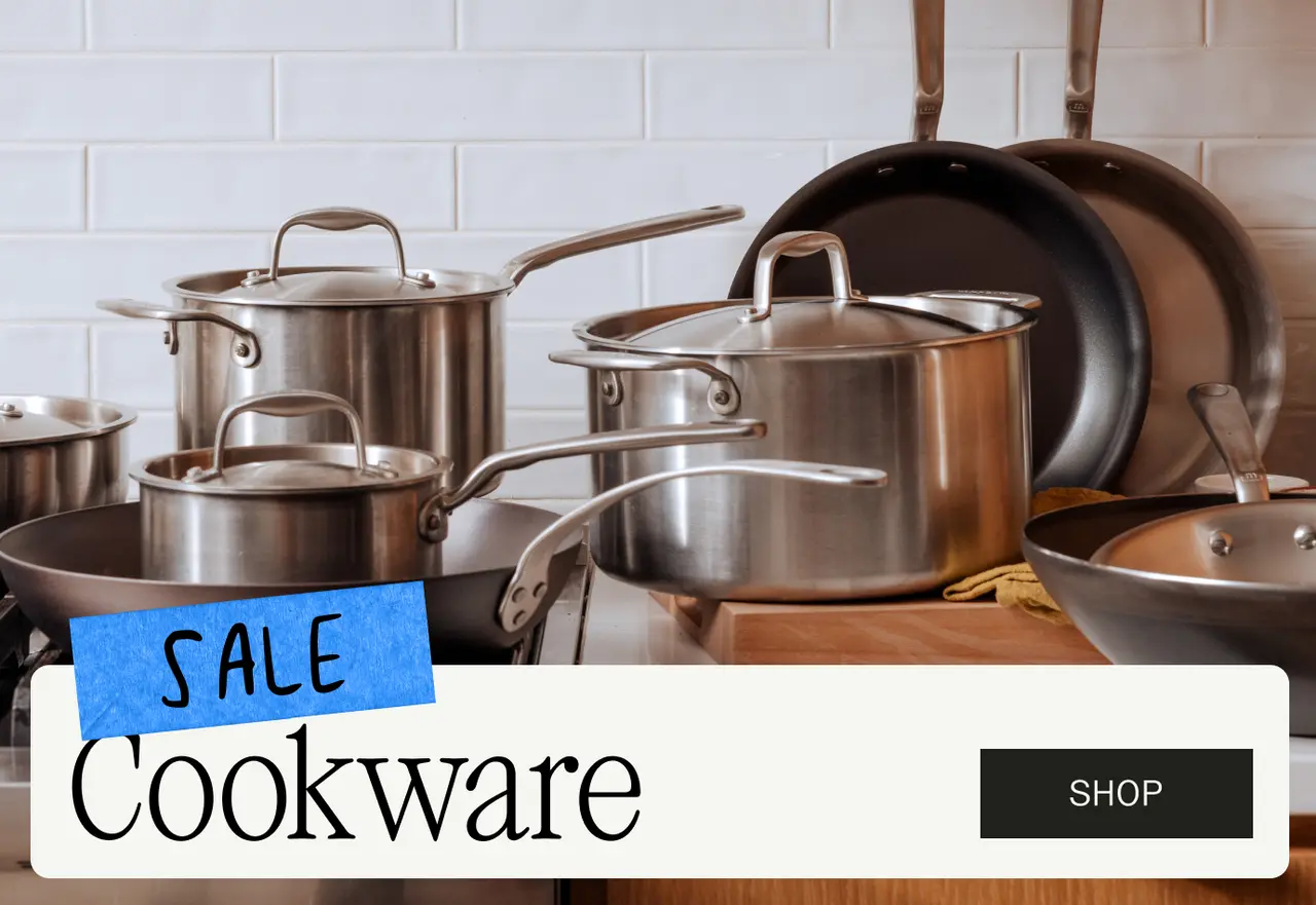 Various stainless steel cookware, including pots and pans, are displayed with a "Sale" banner and a "Shop" button.