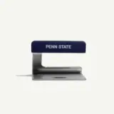 A metal paperweight featuring a blue handle with "PENN STATE" printed on it.
