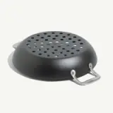 A black perforated cooking pan with two handles designed for steaming or draining foods.