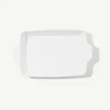 A white rectangular baking dish with handles is shown against a light background.